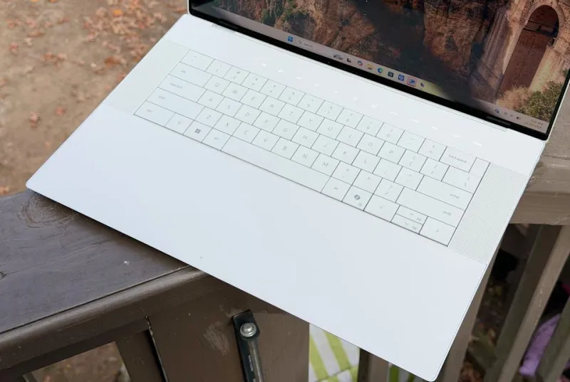 The 16 Premium&#39;s &quot;invisible&quot; trackpad blends seamlessly into its wrist rest, while the keyboard lays perfectly flat and a row of capacitive function keys sits above.