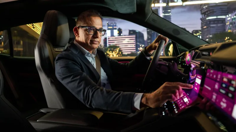 Some rich dude fiddling with a display.