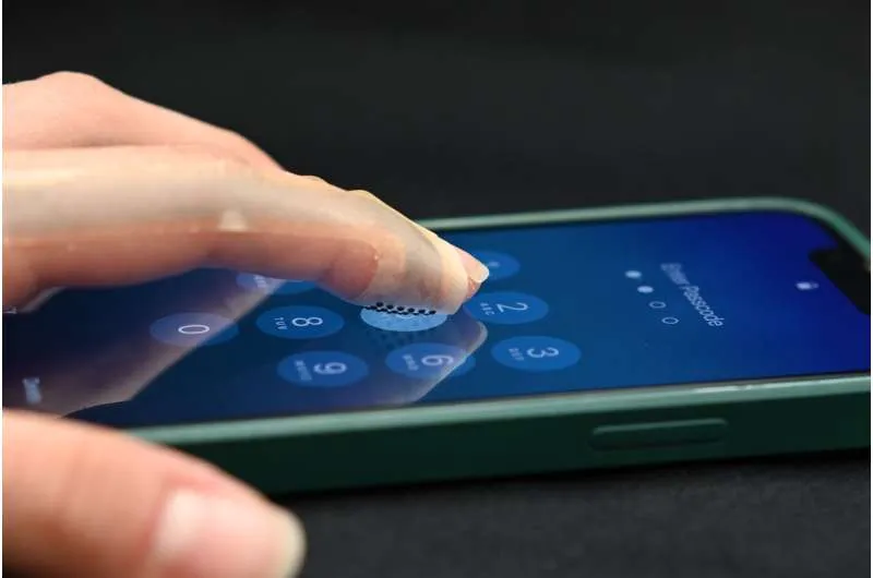 Bandage-like device brings texture to touchscreens