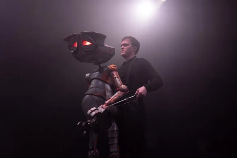 Marvin the Paranoid Android (Andrew Evans) is feeling very depressed.