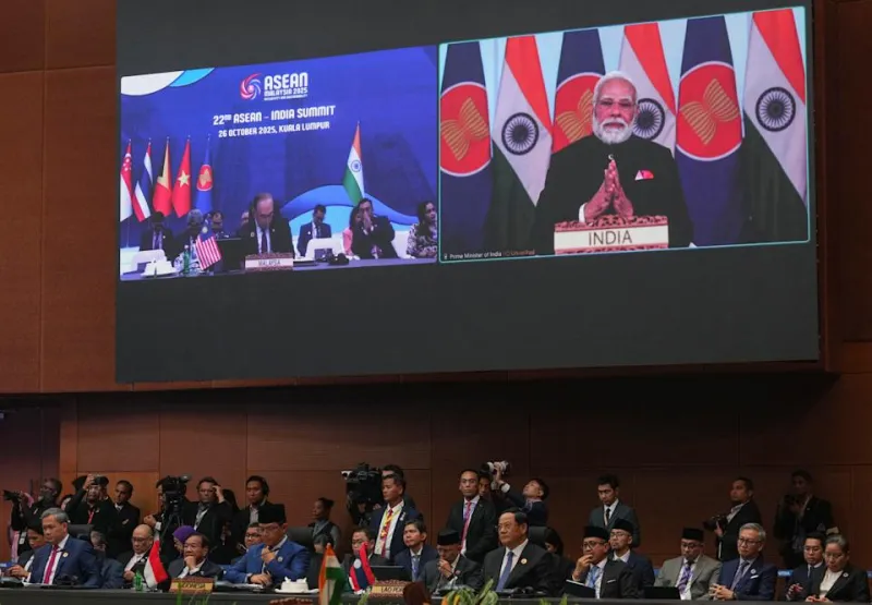 India&#39;s Prime Minister Narendra Modi appears on a screen to deliver a speech remotely as other leaders attend the 22nd ASEAN - India Summit during the 47th Association of Southeast Asian Nations (ASEAN) Summit in Kuala Lumpur on October 26, 2025. (Photo by Rafiq Maqbool / POOL / AFP) (Photo by RAFIQ MAQBOOL/POOL/AFP via Getty Images)          