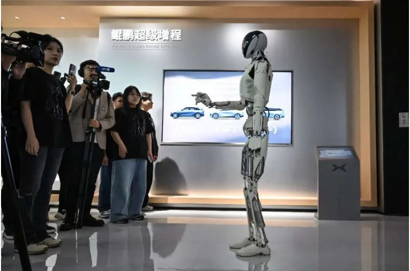 Xpeng's next-gen Iron humanoid robot speaks to media during a showroom tour at its headquarter in Guangzhou