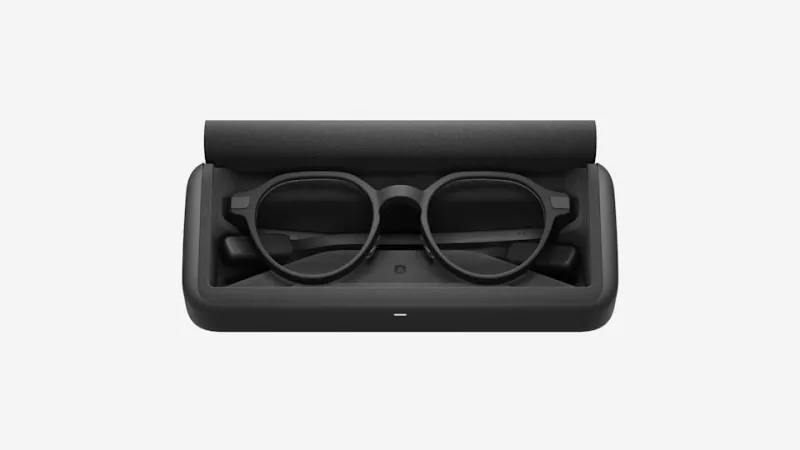 A pair of Even G2 Display Smart Glasses in a charging case.