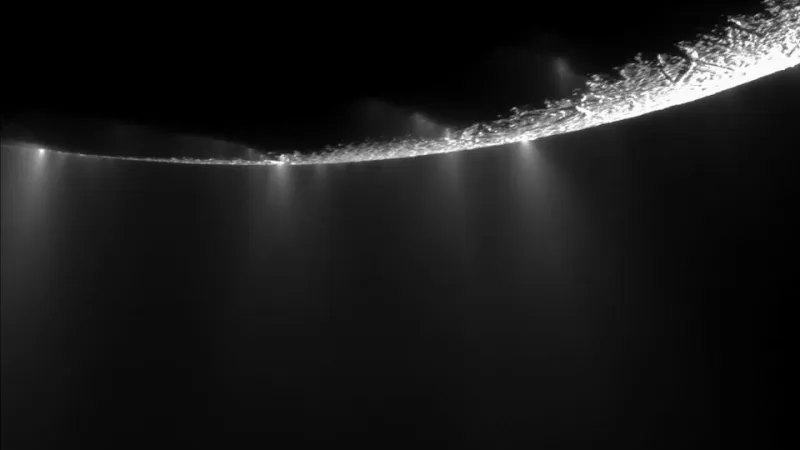 Artist&#39;s depiction of the plumes of ice water emitting from Saturn&#39;s moon Enceladus.